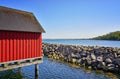 Red stilt house at the harbor Weisse Wiek in Boltenhagen on the Baltic Sea. Germany Royalty Free Stock Photo